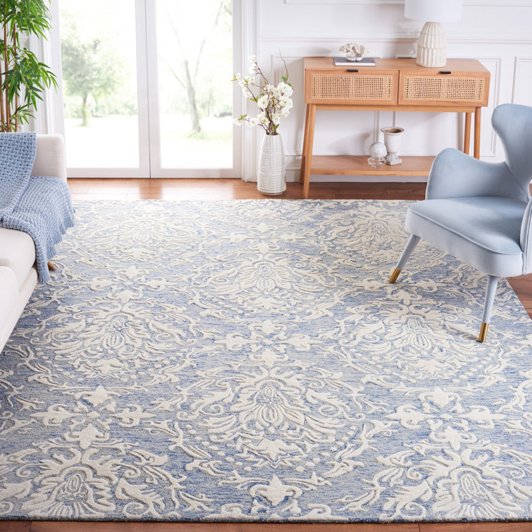 Ferrera Ikat Handmade Tufted Wool Blue / Ivory Area Rug