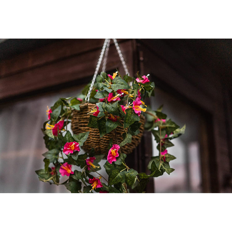 15cm Faux Flowering Plant in Wicker/Rattan Basket