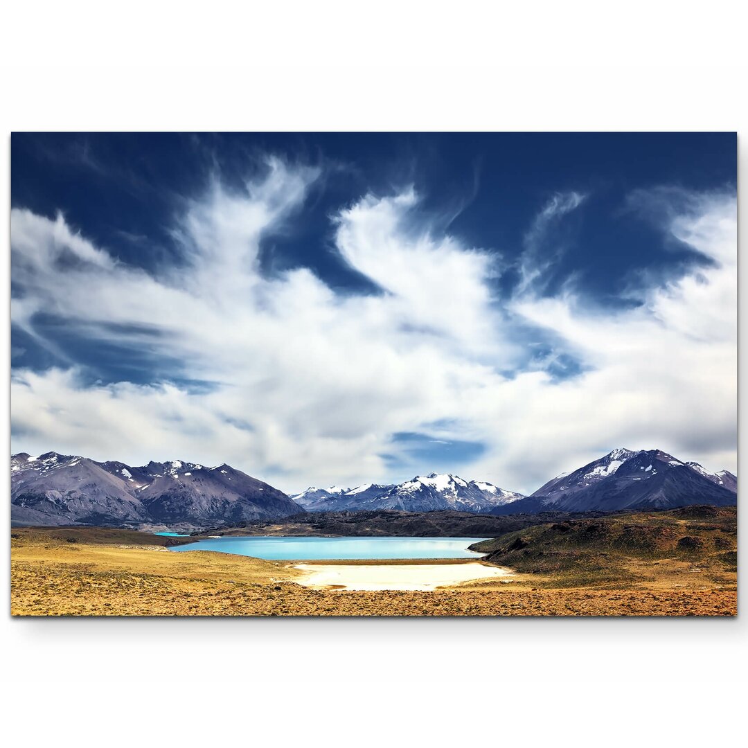 Leinwandbild Blauer See zwischen schneebedeckten Bergen