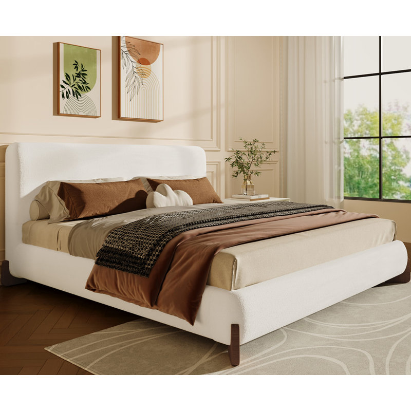 Grand lit tapissier en tissu d'ameublement avec pieds en bois massif