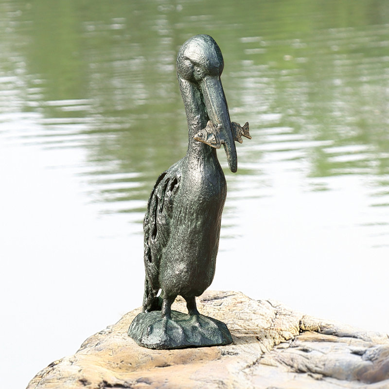 Snacking Pelican Garden Sculpture