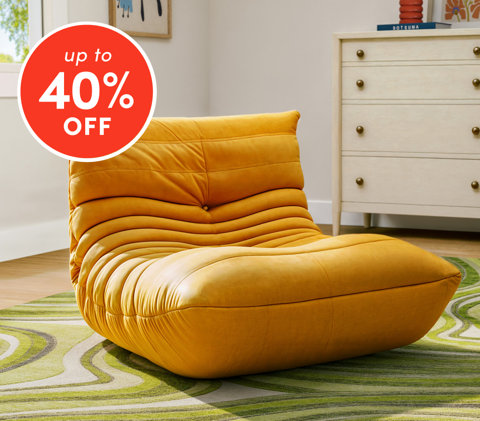 Meubles d'appartement jusqu'à 40 % de rabais avec chaise longue orange