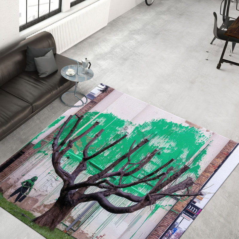 Soft Non-Woven Printed Rug Featuring a Floral Pattern and Intricate Border Design in Earth Tones for a Warm Traditional Touch to Your Living Room or Study