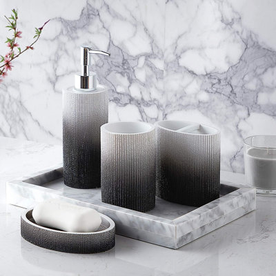 Four piece set of bathroom accessories