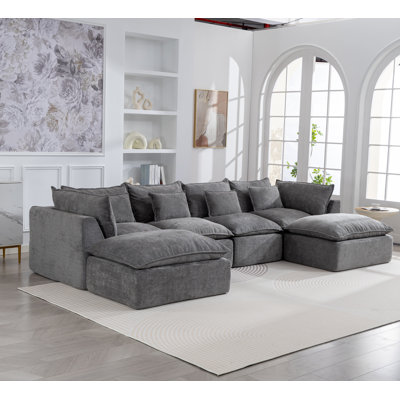 Canapé modulaire surdimensionné surdimensionné avec un siège large et profond, un soutien semblable à un nuage, une véritable détente et une configuration flexible à 4 sièges incluant deux repose-pieds.