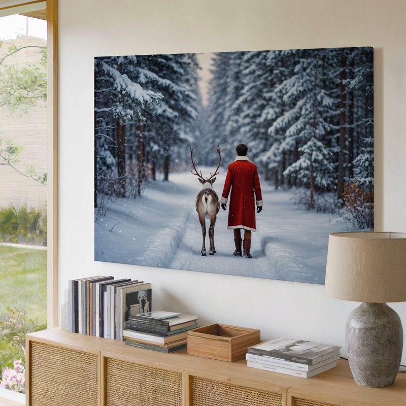 Toile «A Cosy Winter Scene Doté d'une figure dans un art mural rouge avec bordure blanche marchant le long d'un doux renne à travers l'art mural