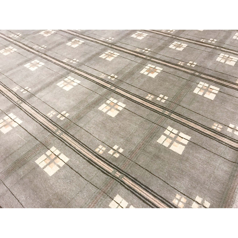 Tapis vert et multicolore noué à la main de haute qualité