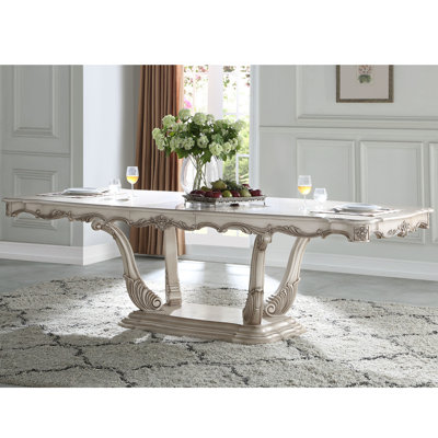 Table de salle à manger au design contemporain et finition ivoire doré