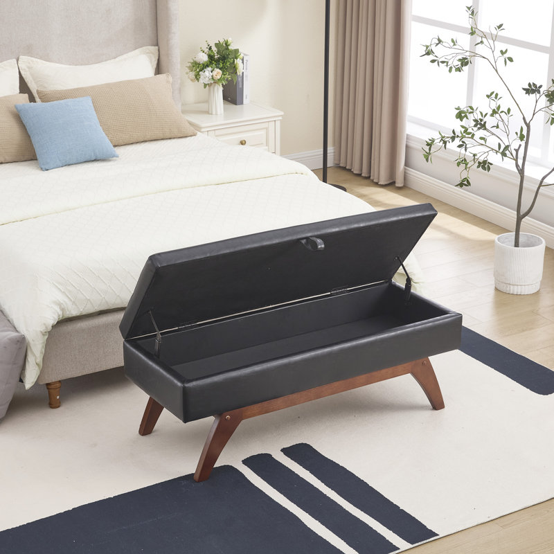 Repose-pieds confortable avec rangement moelleux et pieds en bois massif