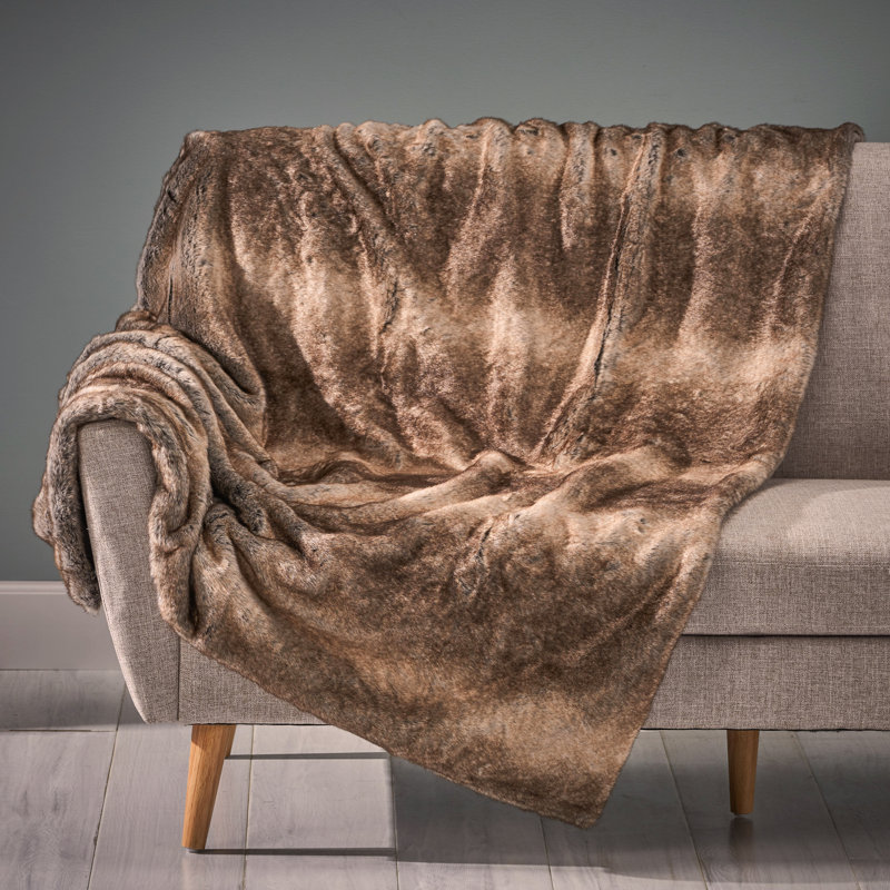 Jeté luxueux en fausse fourrure - doux, confortable et élégant avec un motif rayé, Brun