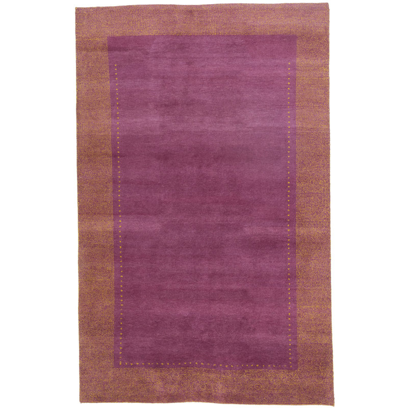 Tapis rose en laine noué à la main