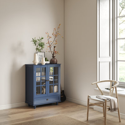 Armoire de rangement à porte en verre bleu marine, armoire de rangement minimaliste en bois avec tablettes de rangement intérieures réglables et tiroir coulissant lisse, armoire de présentation autoportante avec pieds en bois massif pour le vestibule du vestibule du salon