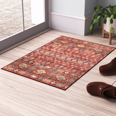 Tapis lavable tissé à la machine rouge et ivoire