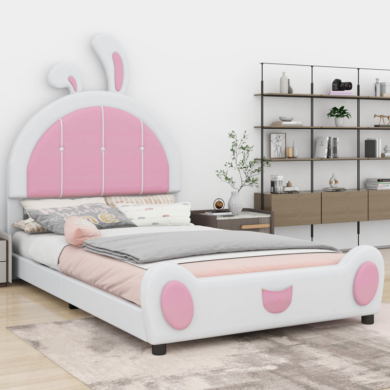 Lit plateforme tapissier avec tête de lit en forme de lapin