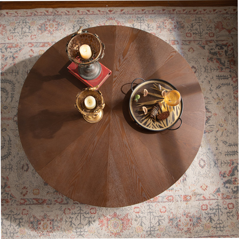 Handcrafted Round Coffee Table With Relief Design, Sturdy Pedestal, And No - Assembly Requirement For Living Room Use