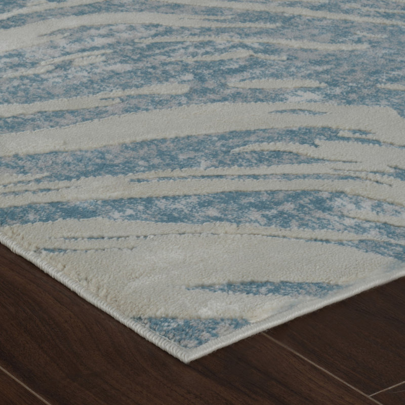 Tapis abstrait bleu et beige 8 pi x 11 pi