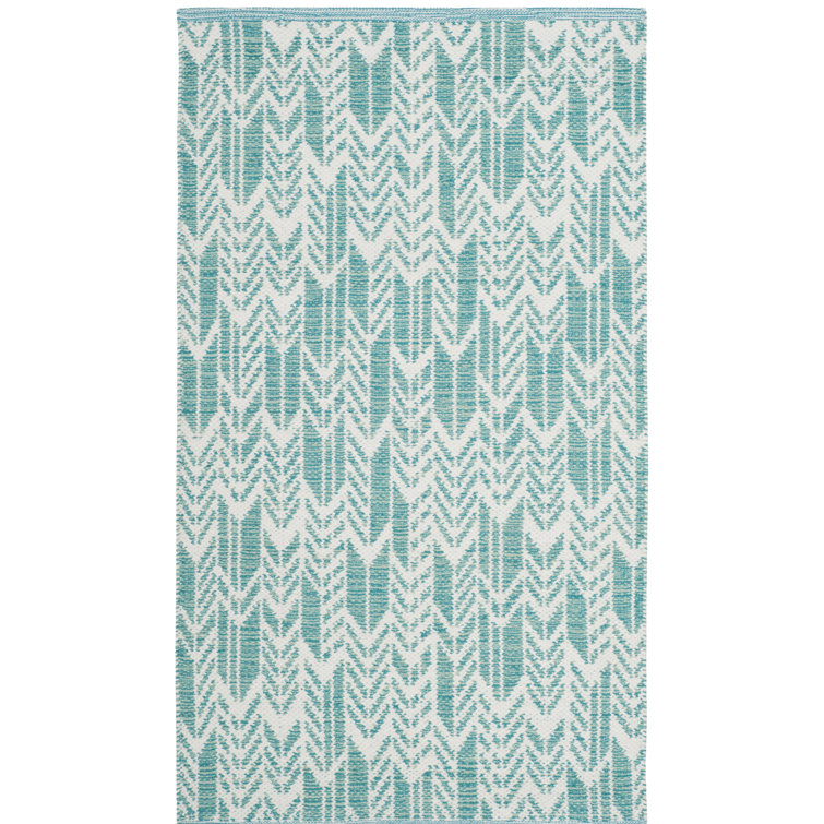 Tapis turquoise / ivoire tissé à plat à la main Legaspi