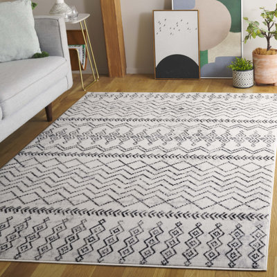 Tapis de style sud-ouest en ivoire / gris / noir Laniqua Temple