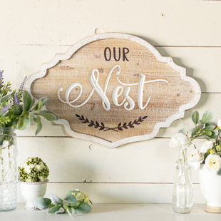 Signe en bois «NEST»