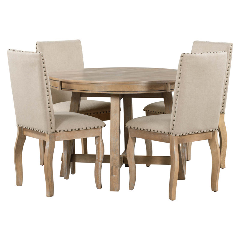 Ensemble de table de salle à manger ronde extensible avec chaises rembourrées, texture en bois naturel, base en X stable, longueur réglable et sièges rembourrés de qualité supérieure.