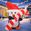 Pingouin gonflable de Noël GOOSH 5 pi tenant une canne de bonbon avec lumières DEL intégrées