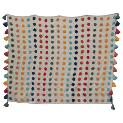 Jeté doux en coton tissé avec pois et pampilles touffetées