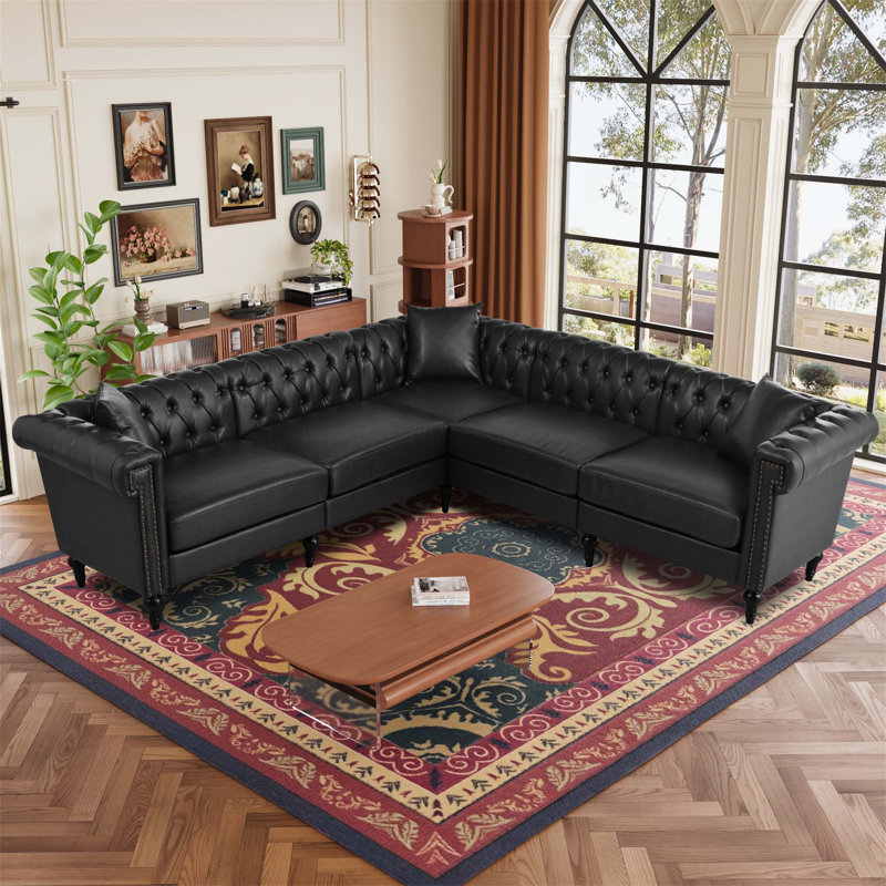 Canapé Chesterfield réversible en forme de L avec accoudoirs roulés et têtes de clou, parfait pour les petits ou grands espaces de vie, confortable et élégant