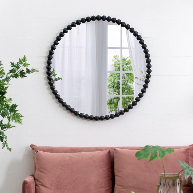 Miroir circulaire avec cadre perlé en métal