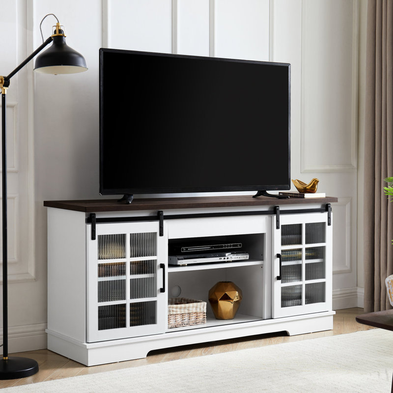 Console de télévision blanche et brune avec portes coulissantes et beaucoup de rangement pour la télé 65 po.