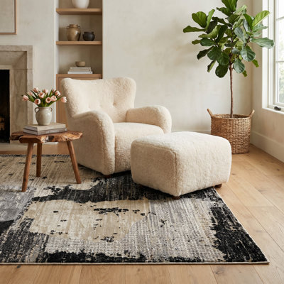 Tapis intérieur / extérieur à motif patchwork abstrait noir / beige 7 pi x 10 pi (6 pi 7 po x 9 pi 6 po) Atlas Branch