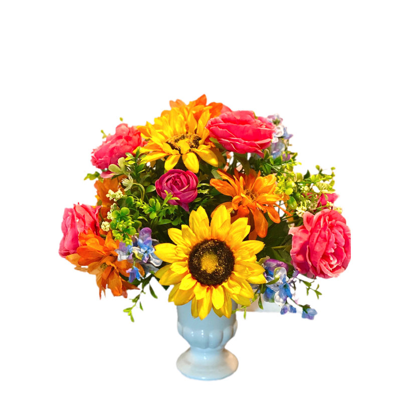 Arrangement floral mélangé dans un vase