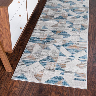  Tapis géométrique beige / bleu