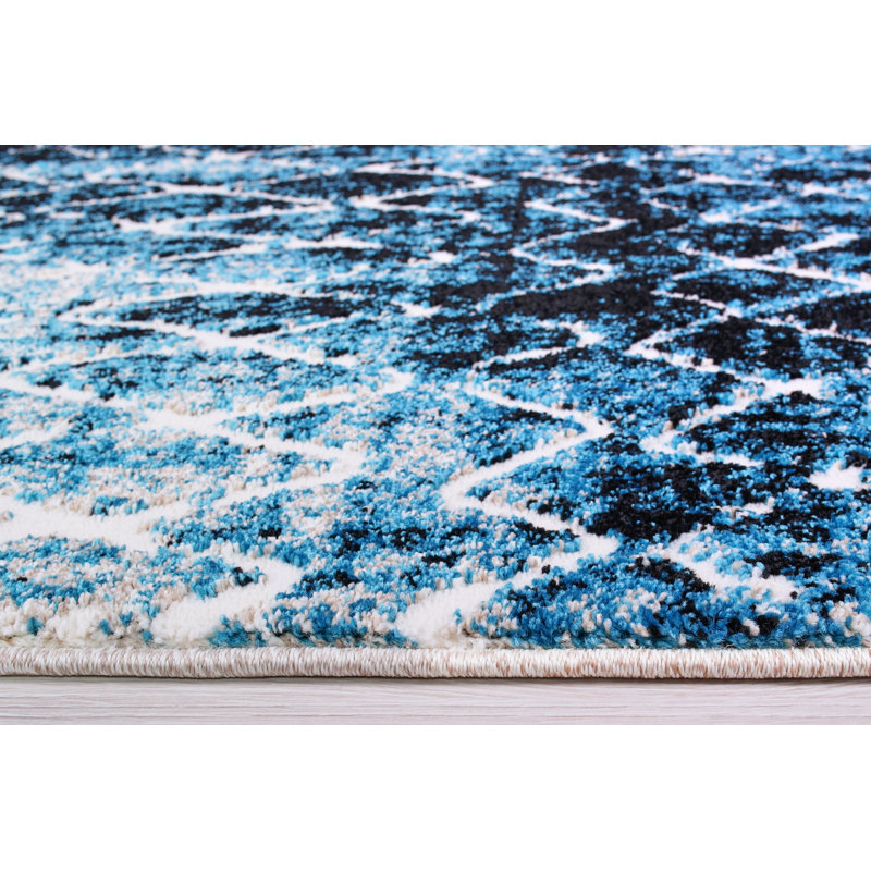 Tapis abstrait turquoise / noir Mangassa, Rectangle 3 pi 9 po x 5 pi 5 po