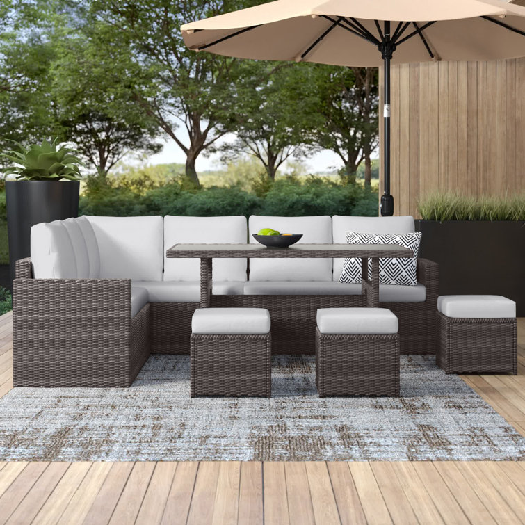 Cueva 7 Piece Rattan Sectional Seating Group with Cushions