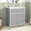 Meuble-lavabo moderne autoportant avec lavabo en céramique et portes à fermeture douce pour une fonctionnalité élégante et silencieuse.