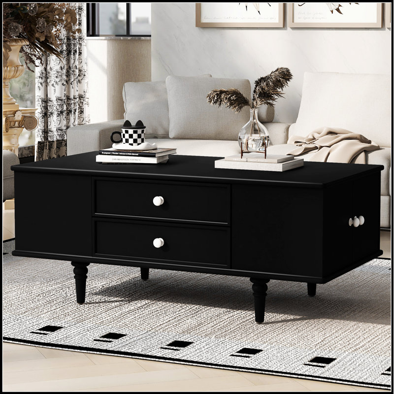 Table basse moderne moderne avec quatre tiroirs, deux compartiments de rangement cachés sur les côtés et des pieds en bois robustes pour le salon
