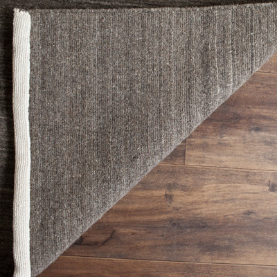 Thendara Hand Loomed Wool/Cotton Solid Color Rug in Charcoal