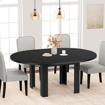 Table de salle à manger extensible ronde de 47 po à 63 po pour 4 à 6 personnes, table de ferme robuste avec 4 pieds robustes en forme de L, table de salle à manger extensible en bois pour petits espaces, table noire