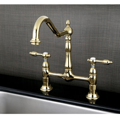 Kingston Brass Tudor Two-Handle 2-Hole Deck Mount Bridge Kitchen Faucet
