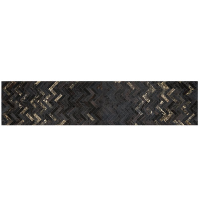 Estrella Cowhide Geometric Area Rug in Black