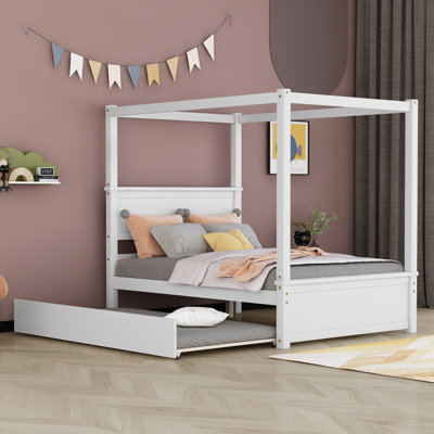 Wood Canopy Bed With Trundle Bed by Harriet Bee