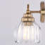 Luminaire de salle de bain 3 lumières Shirley, champagne, or, verre tulipe transparent cannelé de 21,25 po de largeur, acier, à intensité variable, compatible DEL, fixation réversible-132968100
