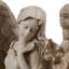 Statue ange assis