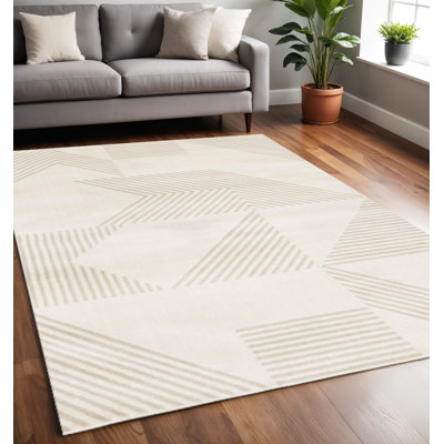 5' X 8' Cream And Beige Geometric Area Rug