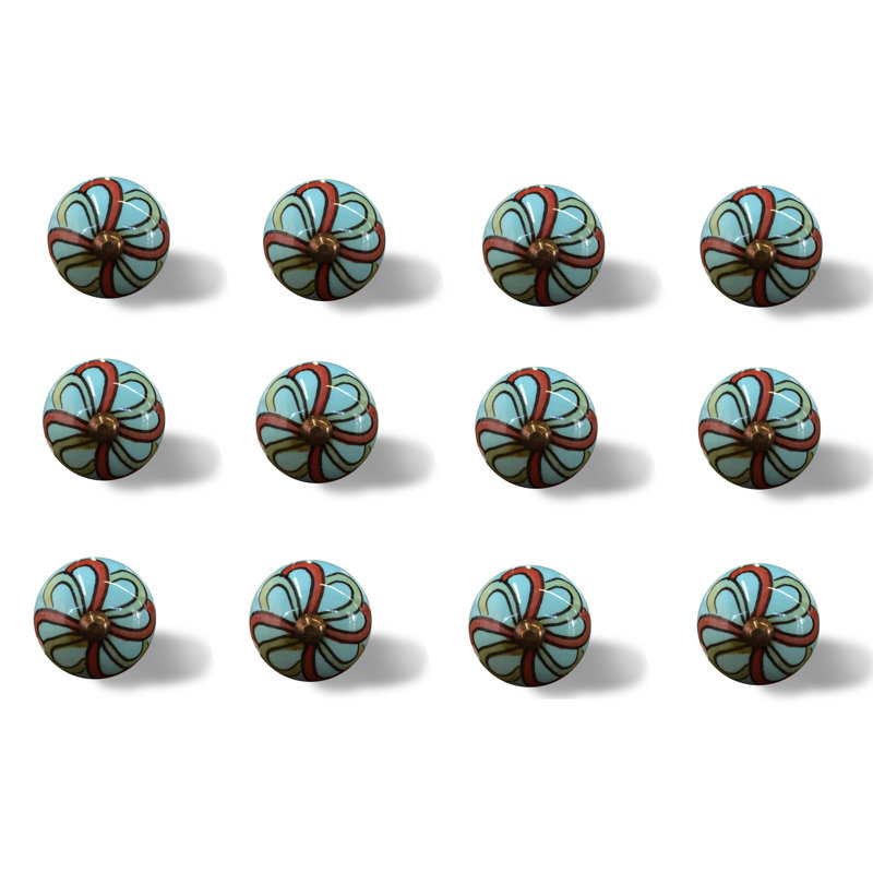 Ensemble de douze poignées de tiroir géométriques en céramique turquoise et rouge