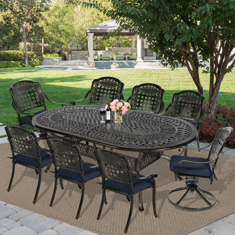 8 - Person Patio Dining Set with Oval Table , Cushions Included, Navy, 9 Pieces: Table, 6 Chairs, 2 Swivel Chairs 