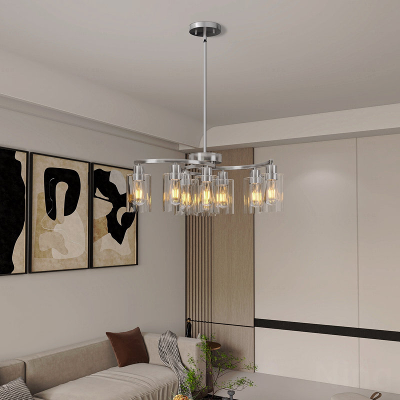 Lustre - configuration en verre nickel brossé à 9 lumières, avec fonction de hauteur réglable suspendue au-dessus de la table de salle à manger de style industriel