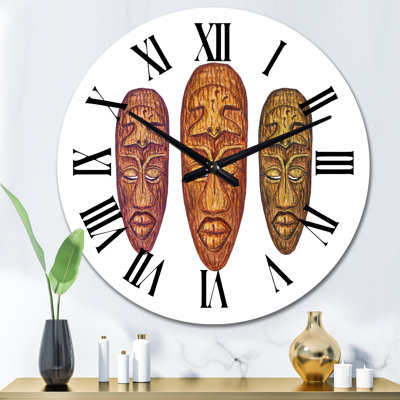Trois masques tribaux en bois - horloge murale rétro