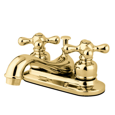 Kingston Brass Restoration Two-Handle 3-Hole Deck Mount 4" Centerset Bathroom Faucet with Plastic Pop-Up
