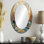Abstrait voiliers au coucher du soleil minimaliste cubiste III - décor de miroir mural ovale brun